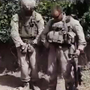 A still frame taken from a YouTube video purportedly shows Marines who desecrated three dead men  thought to be members of the Taliban in Afghanistan.