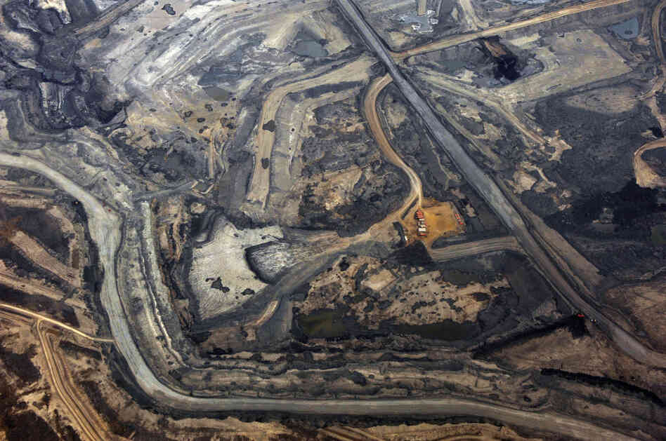 The Syncrude tar sands mine north of Fort McMurray, Alberta, is seen in November. Alberta's tar sands would supply the oil for the prospective Keystone XL pipeline. The Syncrude tar sands mine north of Fort McMurray, Alberta, is seen in November. Alberta's tar sands would supply the oil for the prospective Keystone XL pipeline.