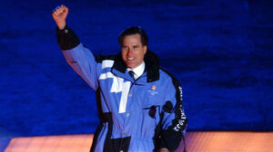 Mitt Romney, then the president of the 2002 Salt Lake Organizing Committee, greets attendees at the opening ceremony of the Winter Olympics in Utah.