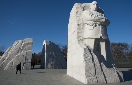 Tourists walk through the Martin Luther King Jr. Memorial honoring the iconic civil rights leader in Washington. Tourists walk through the Martin Luther King Jr. Memorial honoring the iconic civil rights leader in Washington.