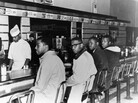 In February 1960, college students (from left) Joseph McNeil, Franklin McCain, Billy Smith and Clarence Henderson began a sit in protest at the whites-only lunch counter at a Woolworth's in Greensboro, N.C. In February 1960, college students (from left) Joseph McNeil, Franklin McCain, Billy Smith and Clarence Henderson began a sit in protest at the whites-only lunch counter at a Woolworth's in Greensboro, N.C.