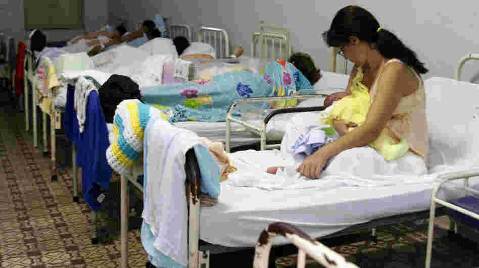 Brazil's fertility rate has dropped dramatically over the past half-century and is now below that in the U.S. Here, women lie with their newborns at the Pro Matre maternity hospital in Rio de Janeiro. 