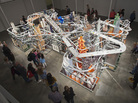 About 1,200 tiny custom-made cars zoom around Metropolis II. If there's an accident, the sculpture comes with nearly 11,000 more toy cars, ready to hit the road. About 1,200 tiny custom-made cars zoom around Metropolis II. If there's an accident, the sculpture comes with nearly 11,000 more toy cars, ready to hit the road.
