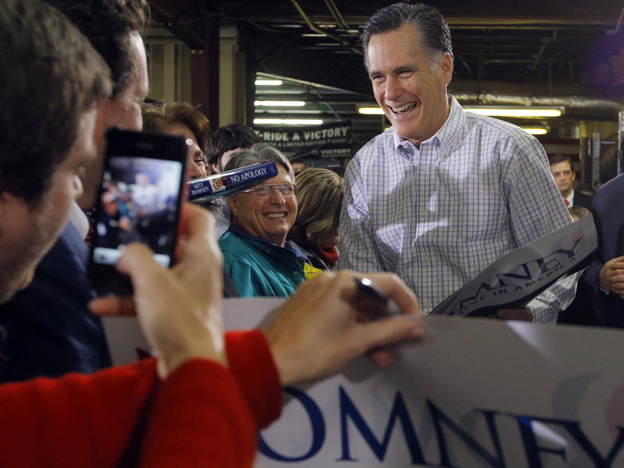 Former Massachusetts Governor Mitt Romney greets supporters during a campaign stop at Cherokee Trikes and More in Greer, S.C. on Thursday. 