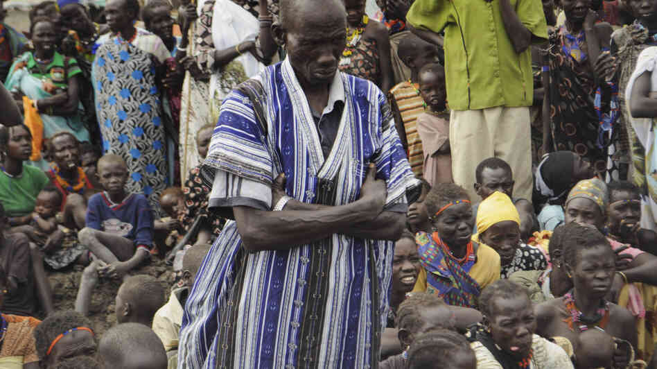 People who escaped ethnic violence in Jonglei state wait for food rations at a World Food Program distribution center on Thursday. South Sudan gained independence just six months ago, and already ethnic tensions inside the new country have forced tens of thousands to flee their homes. 