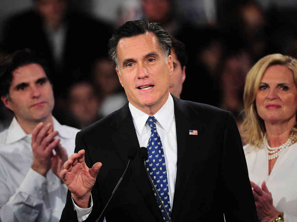 Republican presidential hopeful Mitt Romney addresses a primary night victory rally in New Hampshire on Tuesday. Romney has accused President Obama of engaging in the "politics of envy" by focusing on income inequality.