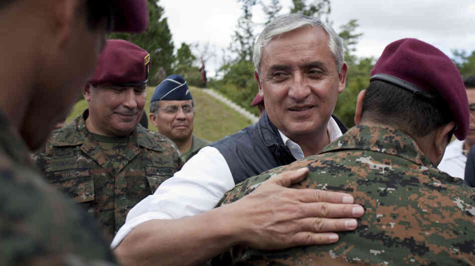 Newly elected president Otto Perez Molina greets members of Guatemala's elite special forces in December. Perez takes office Saturday with a top priority of ending a long-standing U.S. ban on military aid.