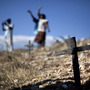 Relatives of those who died in the 2010 earthquake attend a memorial service at the mass grave site in Titanyen, on the outskirts of Port-au-Prince, Haiti, Thursday. Haitians are marking the second anniversary of the devastating 2010 earthquake with church services throughout the country on what is a national holiday of remembrance. 