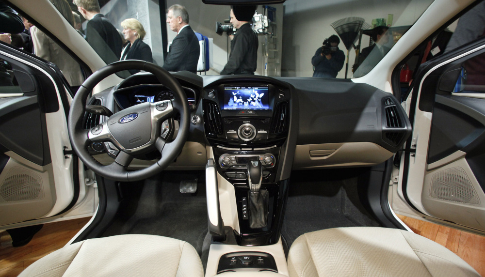  Ford's MyFord Touch interface allows users to manage phone calls, navigation, entertainment and the car's temperature through a touch screen on the dashboard. 
