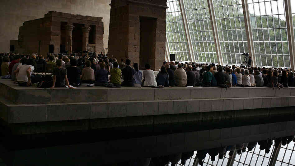 A view from across the reflecting pool of the "Remembering September 11" concert by the Wordless Music Orchestra â conducted by Ryan McAdams, presented at The Temple of Dendur in The Metropolitan Museum of Art in Manhattan on Sept. 11, 2011. A view from across the reflecting pool of the "Remembering September 11" concert by the Wordless Music Orchestra â conducted by Ryan McAdams, presented at The Temple of Dendur in The Metropolitan Museum of Art in Manhattan on Sept. 11, 2011.