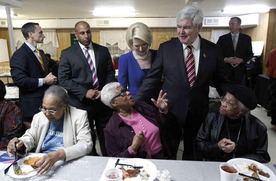 Republican presidential candidate former House Speaker Newt Gingrich, accompanied by his wife, Callista, meets with parishioners during an event Saturday at the Jones Memorial AME Zion Church. Republican presidential candidate former House Speaker Newt Gingrich, accompanied by his wife, Callista, meets with parishioners during an event Saturday at the Jones Memorial AME Zion Church.