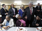 Republican presidential candidate former House Speaker Newt Gingrich, accompanied by his wife, Callista, meets with parishioners during an event Saturday at the Jones Memorial AME Zion Church. Republican presidential candidate former House Speaker Newt Gingrich, accompanied by his wife, Callista, meets with parishioners during an event Saturday at the Jones Memorial AME Zion Church.