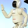 Man and machine stand side-by-side: Honda's Asimo robot.