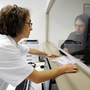France's 35-hour work week has resulted in some workers accumulating vast amounts of overtime that they are required to use this year. The problem is particularly acute at some hospitals. Here a woman speaks with a doctor at the Conception Hospital in Marseille on Tuesday. France's 35-hour work week has resulted in some workers accumulating vast amounts of overtime that they are required to use this year. The problem is particularly acute at some hospitals. Here a woman speaks with a doctor at the Conception Hospital in Marseille on Tuesday.