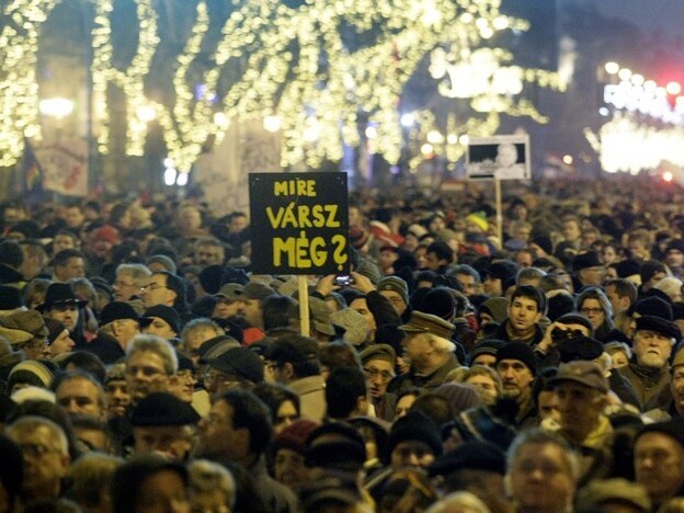 People gather to protest against Hungary's new constitution outside the Opera House in Budapest on Jan. 2. Critics say the document curbs democracy.