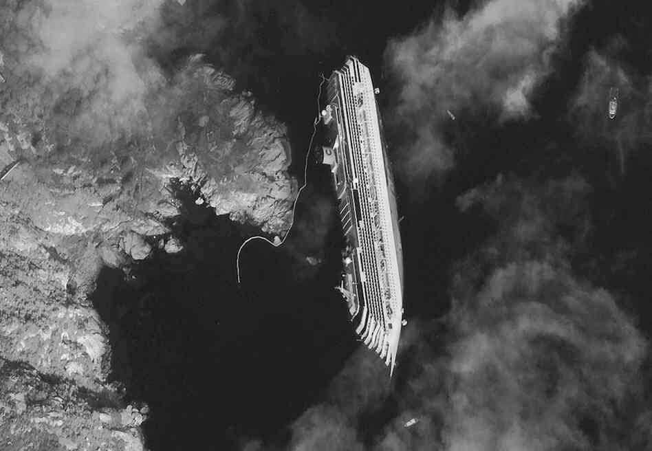 This satellite image taken Tuesday shows the hulk of the luxury ship. 