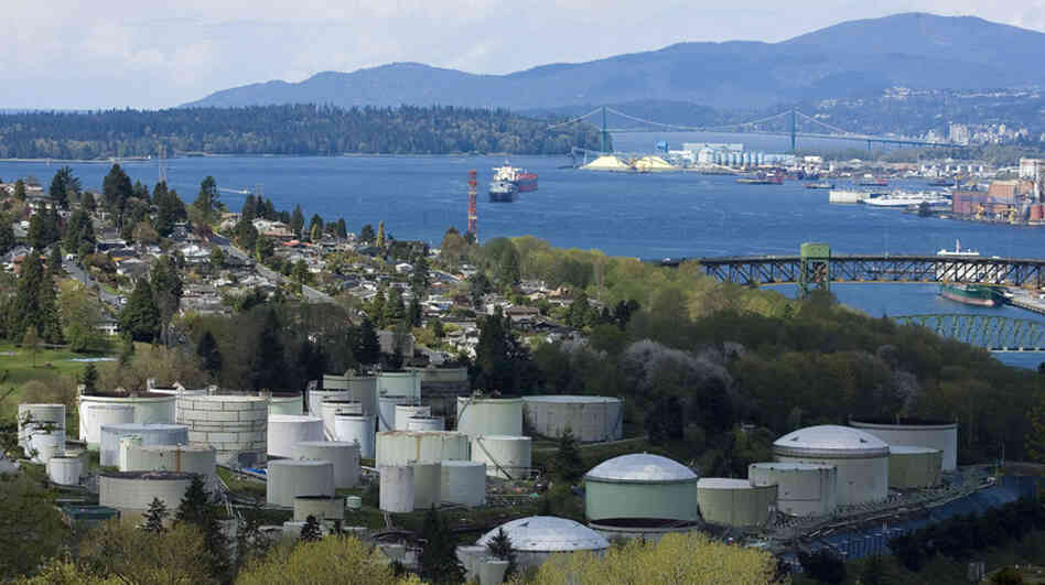 Oil storage tanks at the Chevron Burnaby Oil Refinery on the shores of Burrard Inlet, east of Vancouver, British Columbia. Oil storage tanks at the Chevron Burnaby Oil Refinery on the shores of Burrard Inlet, east of Vancouver, British Columbia.