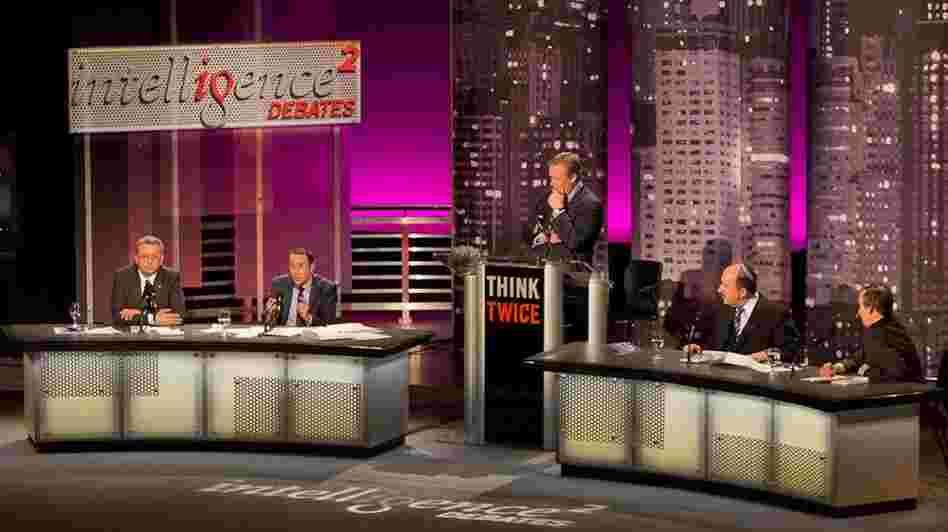Mustafa Barghouthi (from left), Daniel Levy, debate moderator John Donvan, Dore Gold and Aaron David Miller speak before an audience in New York on the motion "The U.N. Should Admit Palestine As A Full Member State." 