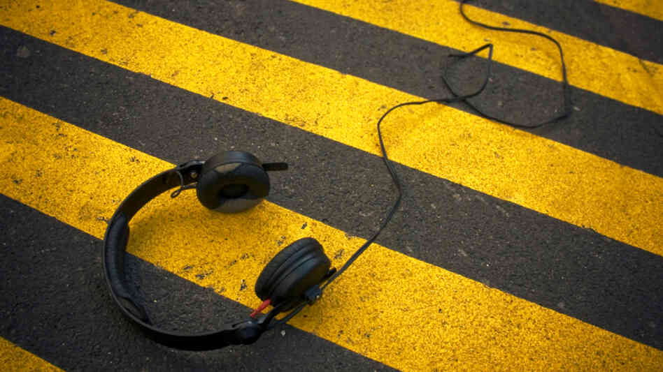 Beware of tuning out while crossing the street. Beware of tuning out while crossing the street.