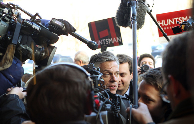 Former Utah Gov. Jon Huntsman was surrounded by members of the media during a campaign stop earlier this month in Dover, N.H.