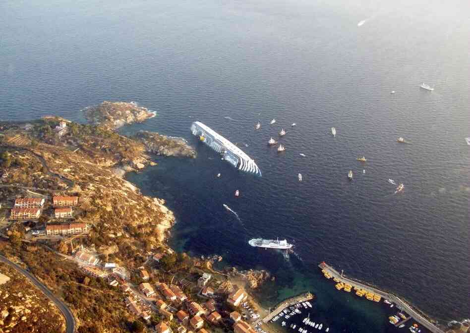 This photo, released by the Italian border police, shows the Costa Concordia last week, after it ran aground. 