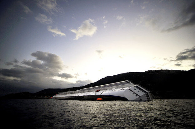 The Costa Concordia lies stranded in the Giglio harbor on Tuesday. 