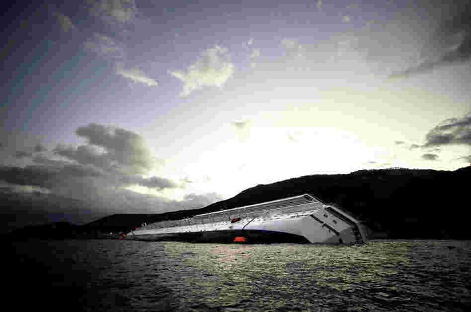 The Costa Concordia lies stranded in the Giglio harbor on Tuesday. 