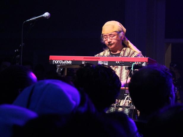 Nobuo Uematsu plays keyboard with Earthbound Papas, a rock band made up of video-game soundtrack composers.