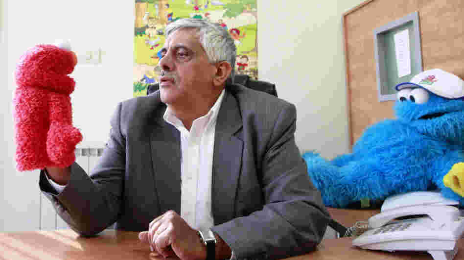 Daoud Kuttab, executive producer of Shara'a Simsim, the Palestinian version of Sesame Street, holds a Muppet at his office in the West Bank city of Ramallah earlier this month. The producers say they have been forced to put production for the 2012 season on hold because of a funding freeze by the U.S. Congress. Daoud Kuttab, executive producer of Shara'a Simsim, the Palestinian version of Sesame Street, holds a Muppet at his office in the West Bank city of Ramallah earlier this month. The producers say they have been forced to put production for the 2012 season on hold because of a funding freeze by the U.S. Congress.