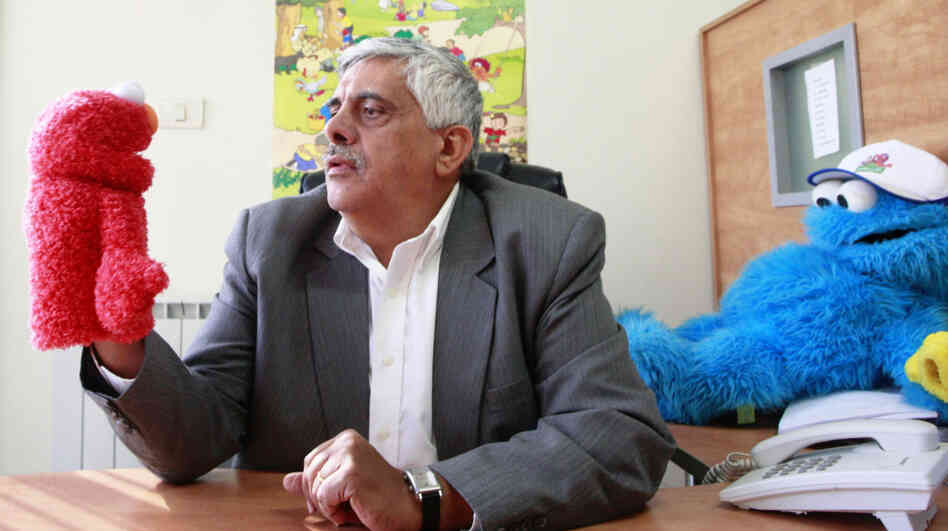 Daoud Kuttab, executive producer of Shara'a Simsim, the Palestinian version of Sesame Street, holds a Muppet at his office in the West Bank city of Ramallah earlier this month. The producers say they have been forced to put production for the 2012 season on hold because of a funding freeze by the U.S. Congress. Daoud Kuttab, executive producer of Shara'a Simsim, the Palestinian version of Sesame Street, holds a Muppet at his office in the West Bank city of Ramallah earlier this month. The producers say they have been forced to put production for the 2012 season on hold because of a funding freeze by the U.S. Congress.