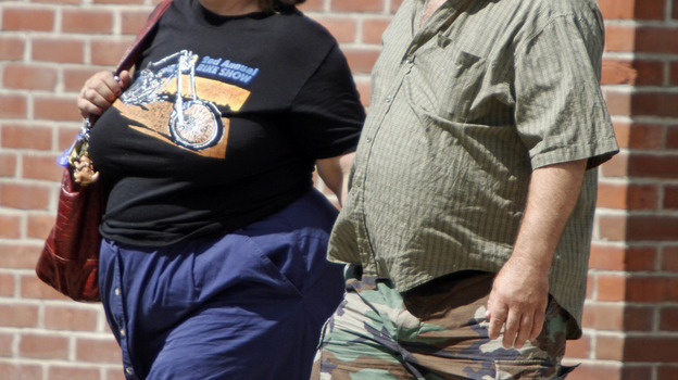 People stroll down a street in Montpelier, Vt., last summer. In 1995, 13.4 percent of Vermonters were considered obese. The figure climbed to 23.5 percent in 2011. The latest national data suggest the obesity epidemic has plateaued, however.