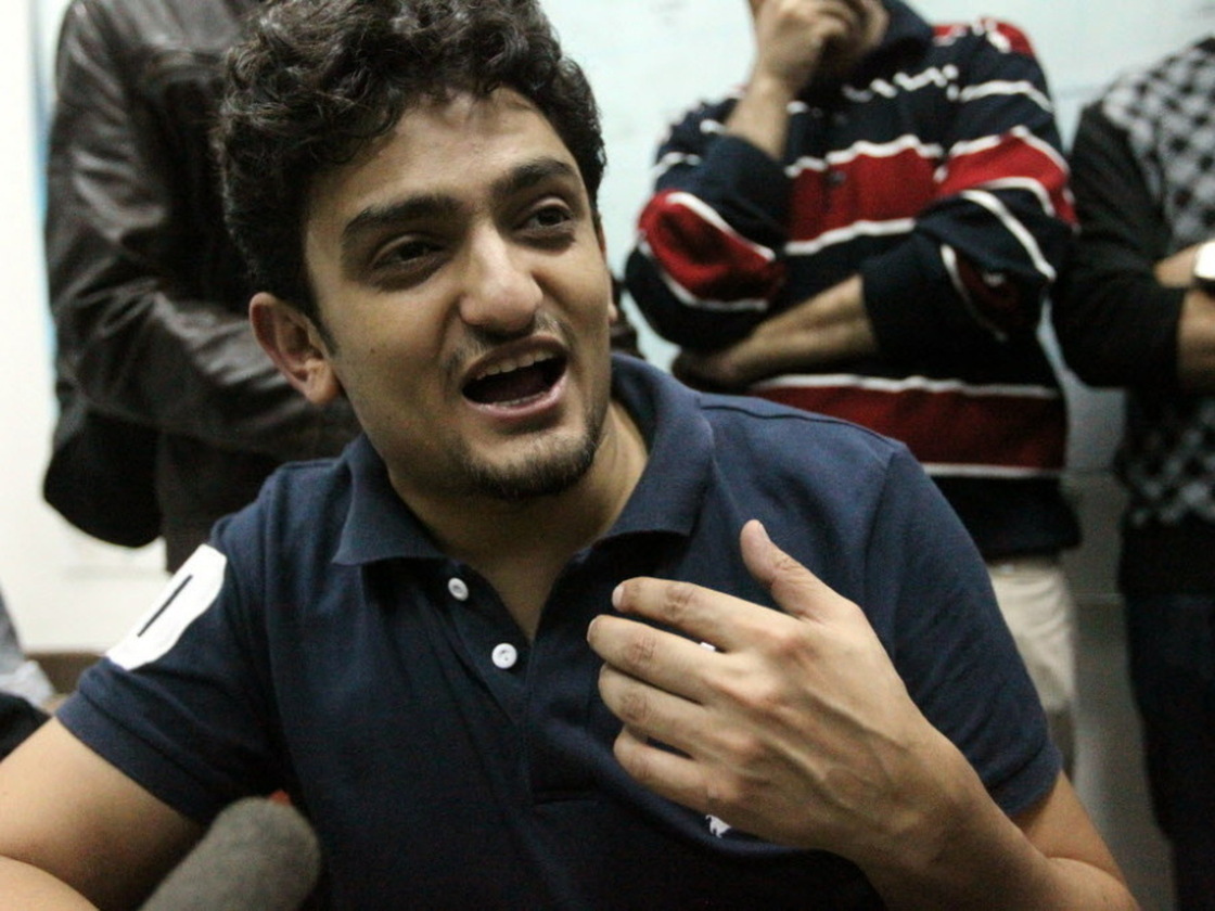 Wael Ghonim talking with reporters on Feb. 8, 2011, in Cairo's Tahrir Square as protests there continued. 