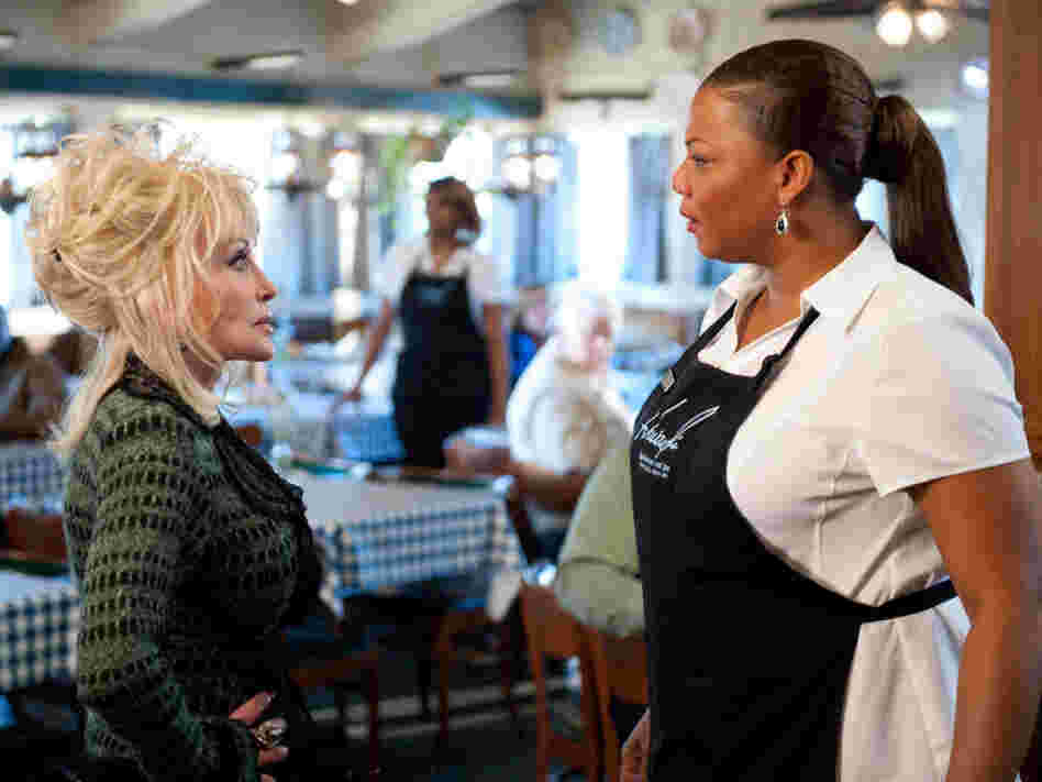 G.G. Sparrow (Dolly Parton) and Vi Rose Hill (Queen Latifah) clash in the new film Joyful Noise. 