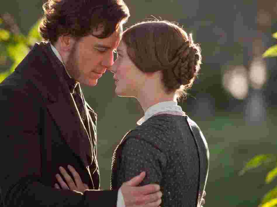 Michael Fassbender (left, with Mia Wasikowska) is Jane's employer and eventual lover, Rochester, in Jane Eyre.