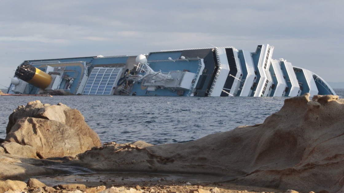 The cruise ship Costa Concordia leans on its side off the Tuscan island of Giglio, Italy.