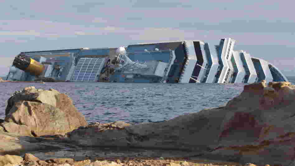 The cruise ship Costa Concordia leans on its side off the Tuscan island of Giglio, Italy.
