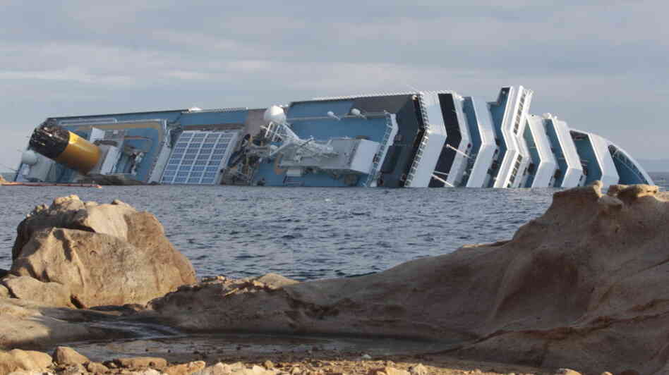 The cruise ship Costa Concordia leans on its side off the Tuscan island of Giglio, Italy.