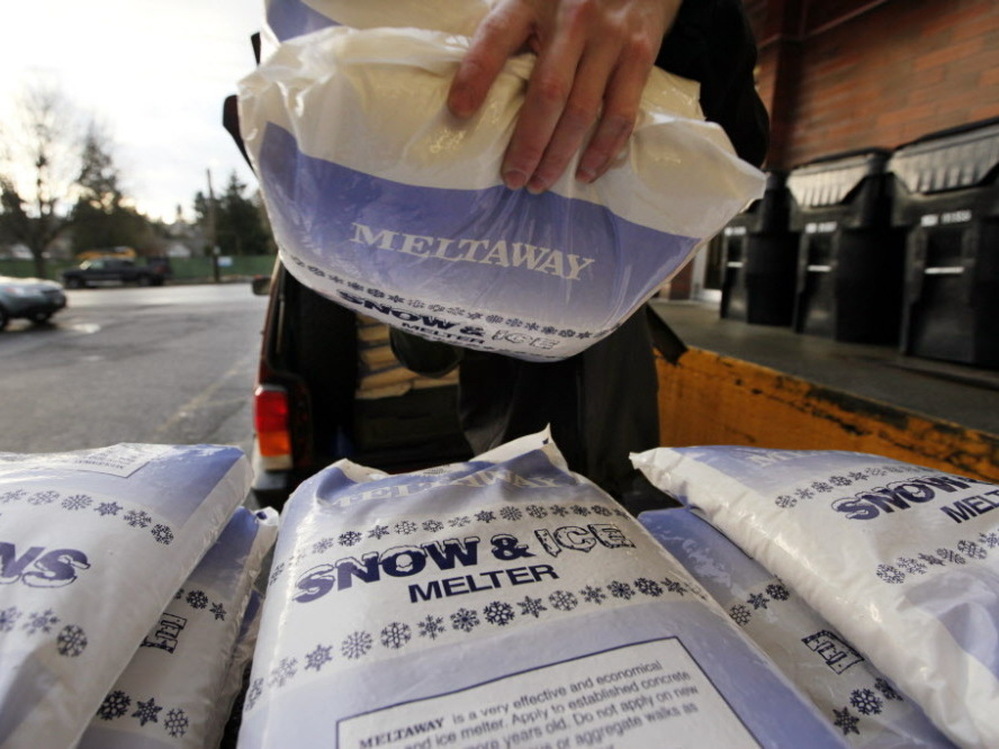 Bags of a deicing product were being stacked outside a hardware store in Seattle on Tuesday, as folks prepared for today's bad weather.