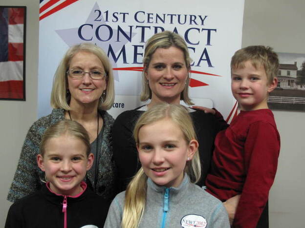 The family poses for a snapshot at Newt Gingrich's campaign headquarters in Greenville, S.C. Back row, left to right: grandmother Carolyn Ball with her daughter, Sondra Ziegler; Ziegler's 5-year-old son, Sam.   Front row, left to right: 9-year-old Alexandra and 10-year-old Abigail Ziegler. 