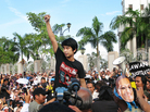 Student activist Adam Adli addresses protesters outside Malaysia's high court in Kuala Lumpur on Jan. 9. The crowd was awaiting a verdict in the trial of opposition leader Anwar Ibrahim, who was acquitted on charges of sodomy shortly afterward. Adam is leading the fight to abolish a decades-old law that bans college students from joining or speaking in support of political parties. Student activist Adam Adli addresses protesters outside Malaysia's high court in Kuala Lumpur on Jan. 9. The crowd was awaiting a verdict in the trial of opposition leader Anwar Ibrahim, who was acquitted on charges of sodomy shortly afterward. Adam is leading the fight to abolish a decades-old law that bans college students from joining or speaking in support of political parties.