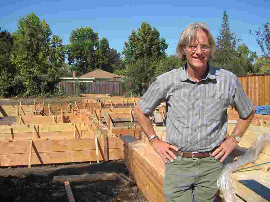 James Witt stands next to the foundation of a house he is building in Palo Alto. Witt has built a successful business by tearing down and rebuilding houses in Silicon Valley. James Witt stands next to the foundation of a house he is building in Palo Alto. Witt has built a successful business by tearing down and rebuilding houses in Silicon Valley.