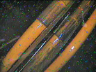 This photo, taken by a remote-controlled endoscope and released by Tokyo Electric Power Co., shows structures assumed to be small size piping or cable conduit inside the beaker-shaped containment vessel of No. 2 reactor at the damaged Fukushima Dai-ichi nuclear power plant. This photo, taken by a remote-controlled endoscope and released by Tokyo Electric Power Co., shows structures assumed to be small size piping or cable conduit inside the beaker-shaped containment vessel of No. 2 reactor at the damaged Fukushima Dai-ichi nuclear power plant.