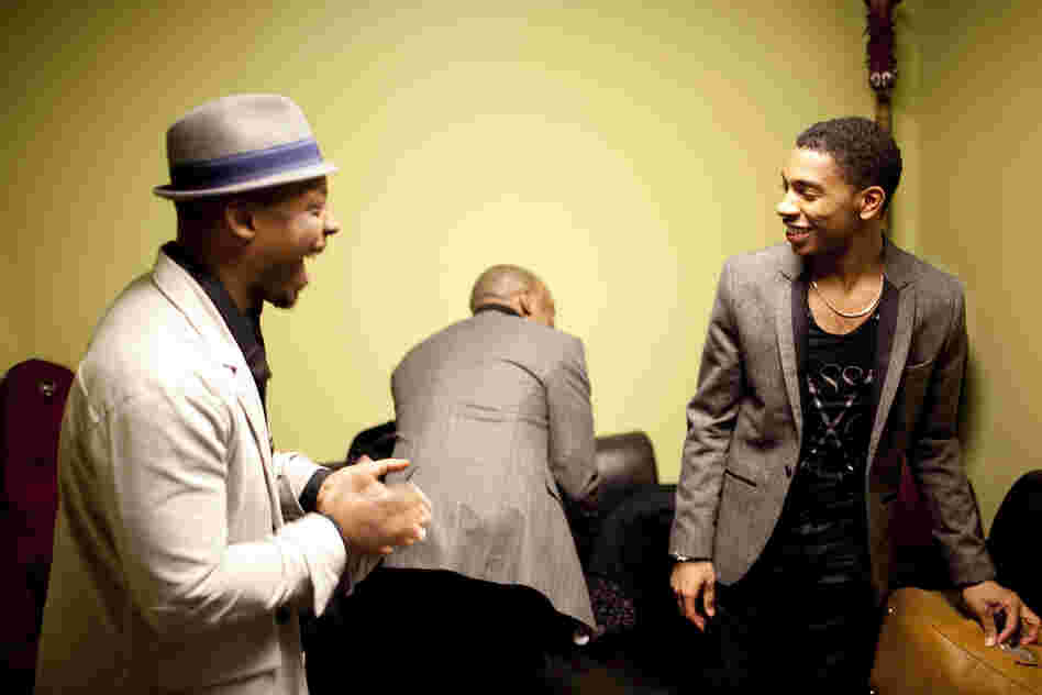 Marcus Strickland (left) speaks with Christian Sands, who performed in the previous set, backstage. Jaleel Shaw is in the background.