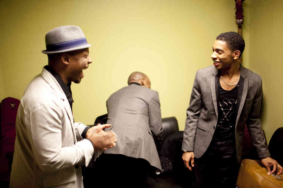 Marcus Strickland (left) speaks with Christian Sands, who performed in the previous set, backstage. Jaleel Shaw is in the background.