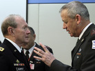 The chairman of the U.S. Joint Chiefs of Staff, Gen. Martin Dempsey (left), is in Israel to talk about the growing tension with Iran. Here, Dempsey speaks with Israel's top military officer, Lt. Gen. Benjamin Gantz, during a meeting at NATO headquarters in Brussels on Wednesday. The chairman of the U.S. Joint Chiefs of Staff, Gen. Martin Dempsey (left), is in Israel to talk about the growing tension with Iran. Here, Dempsey speaks with Israel's top military officer, Lt. Gen. Benjamin Gantz, during a meeting at NATO headquarters in Brussels on Wednesday.