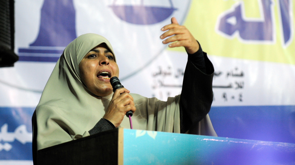 Many Egyptian women hoped to make political gains following the country's revolution. But female candidates fared extremely poorly in the recent parliamentary elections. Here, Huda Ghaniya of the Democratic Alliance, an Islamist grouping, campaigns last Nov. 11.