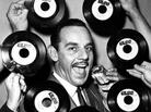 Band leader Johnny Otis poses for a portrait in surrounded by "The Jelly Roll" records in 1947. Band leader Johnny Otis poses for a portrait in surrounded by "The Jelly Roll" records in 1947.