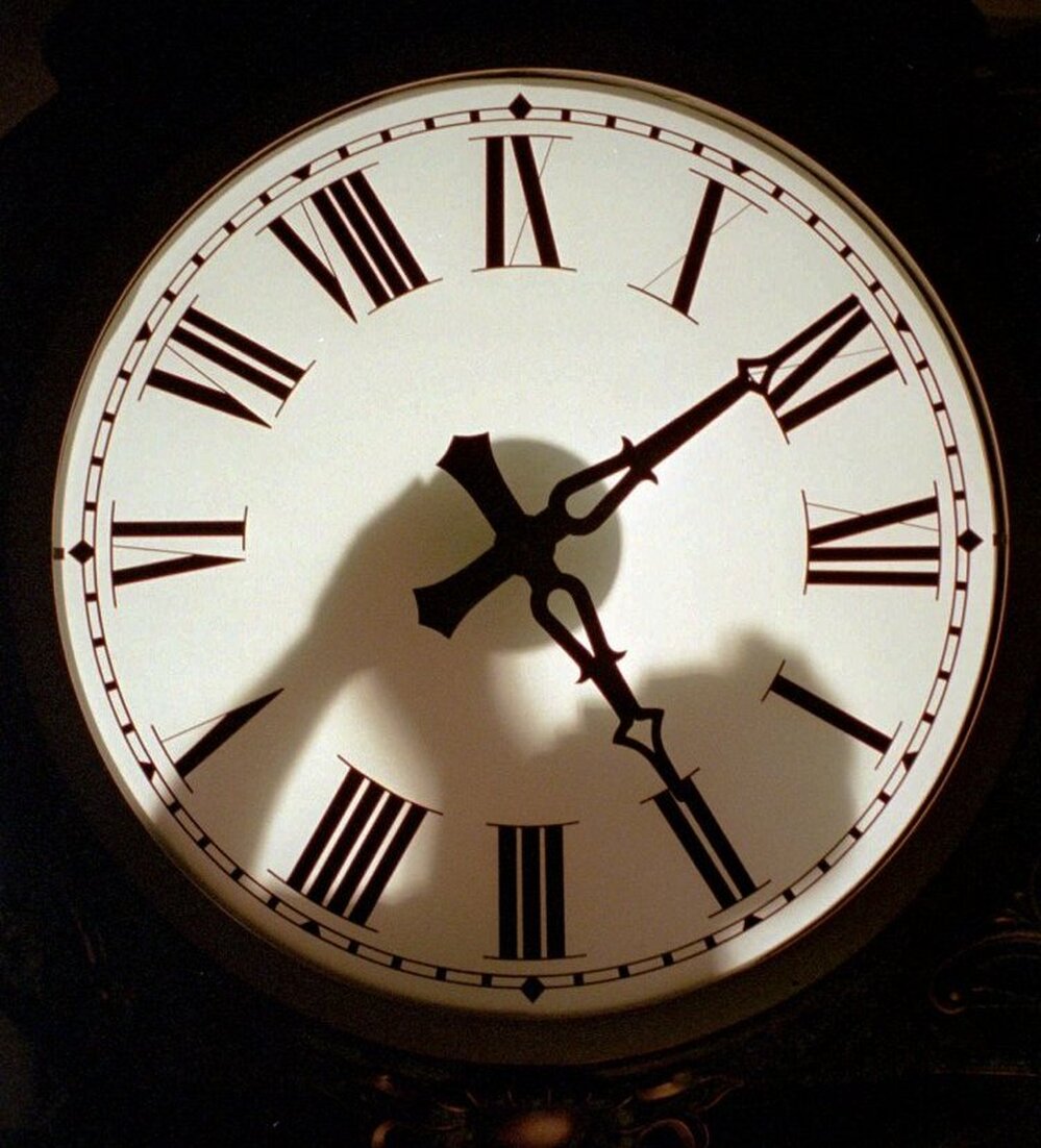 Time to scrap the leap second? No decision just yet. (1997 file photo from the Electric Time Co. factory in Medfield, Mass.)