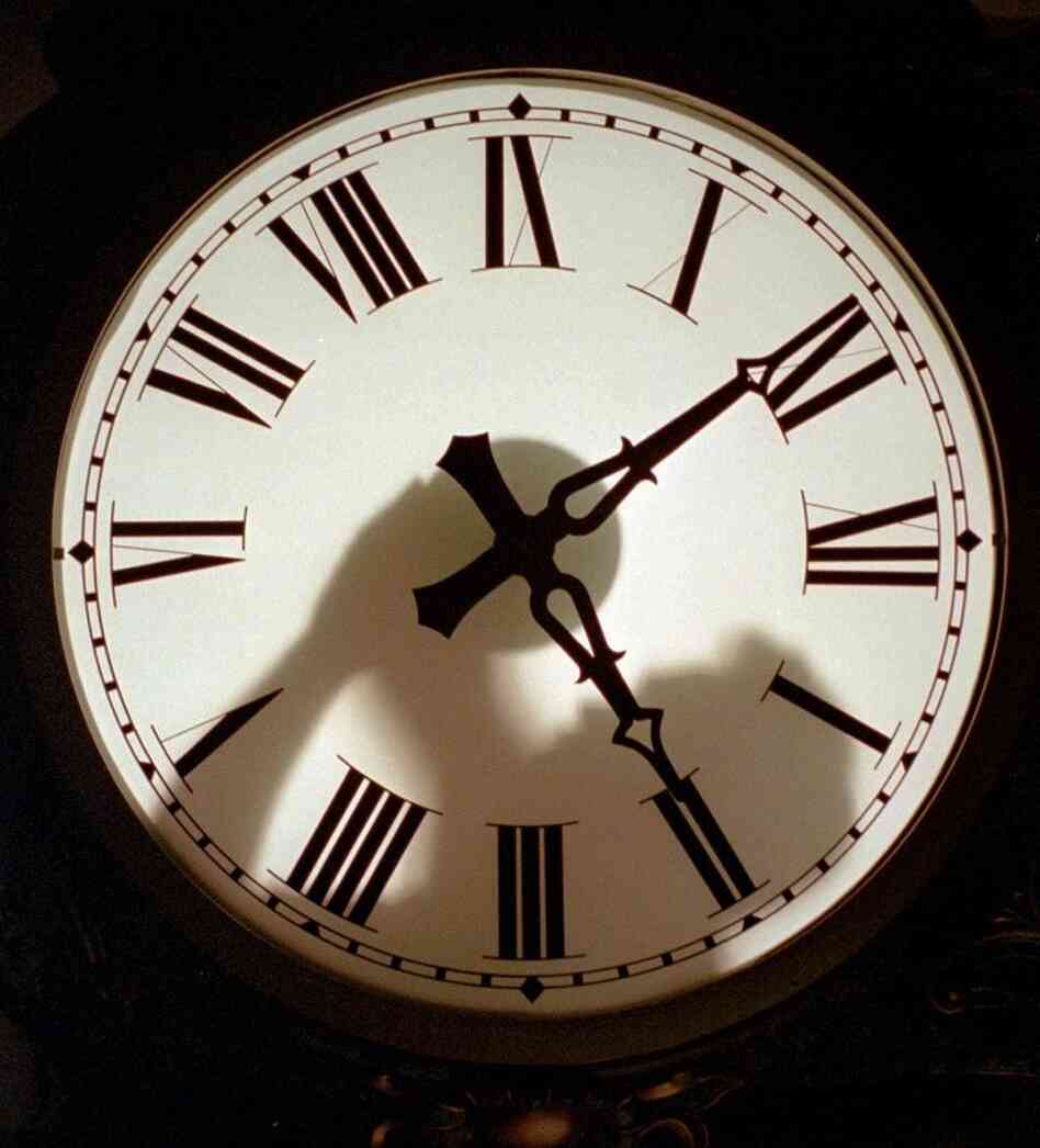 Time to scrap the leap second? No decision just yet. (1997 file photo from the Electric Time Co. factory in Medfield, Mass.)