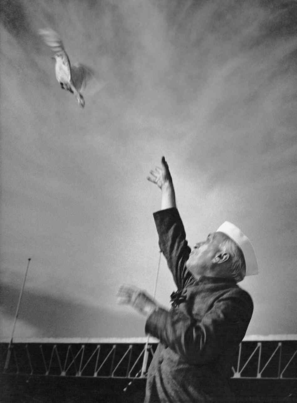 Jawaharlal Nehru, India's first prime minister, releases a pigeon at the National Stadium in Delhi in the mid-1950s. Vyarawalla's favorite subject was Nehru, whom she refered to as "photogenic."